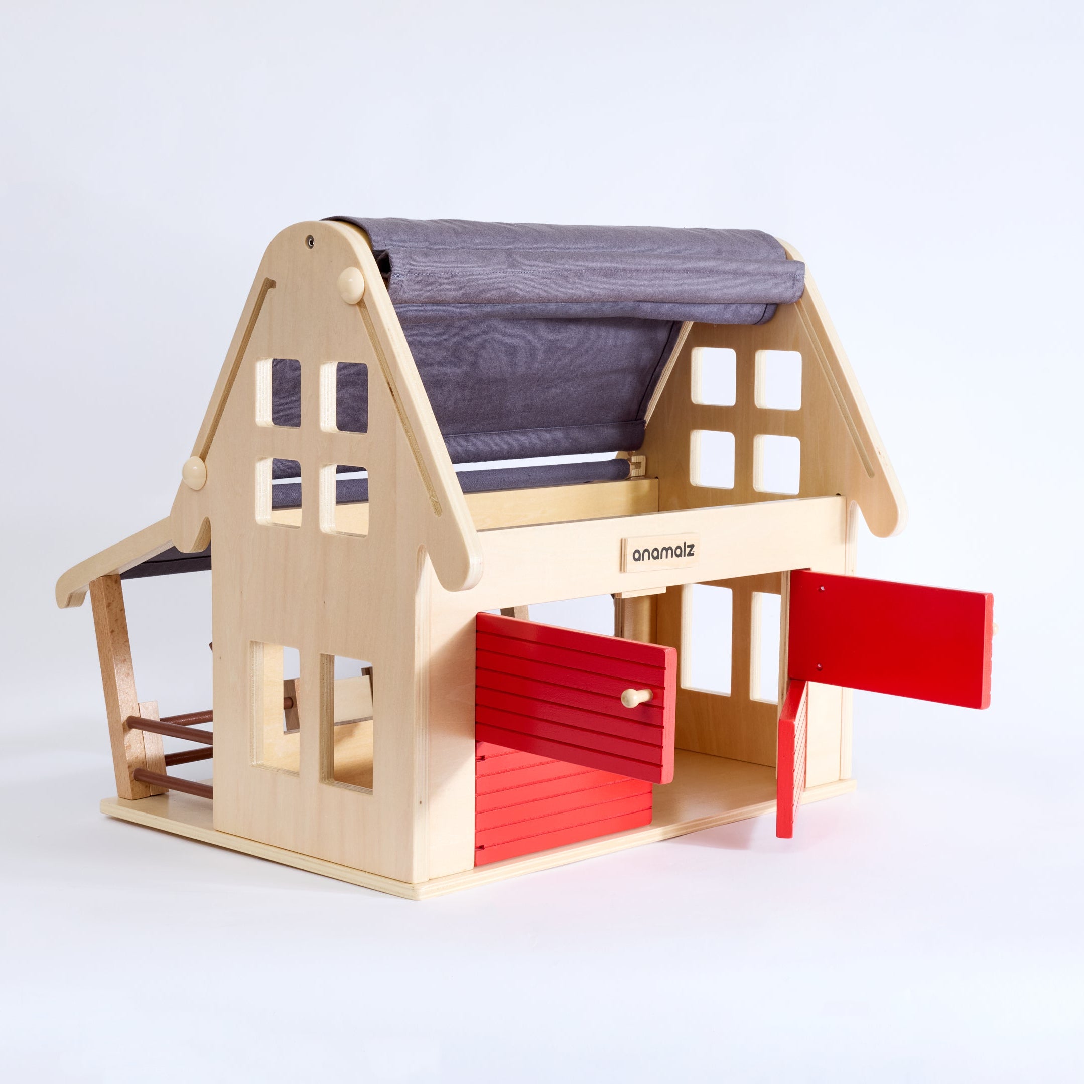 Inside the Anamalz wooden barnhouse playset – includes hay bales, ladder, and space for farm animal toys